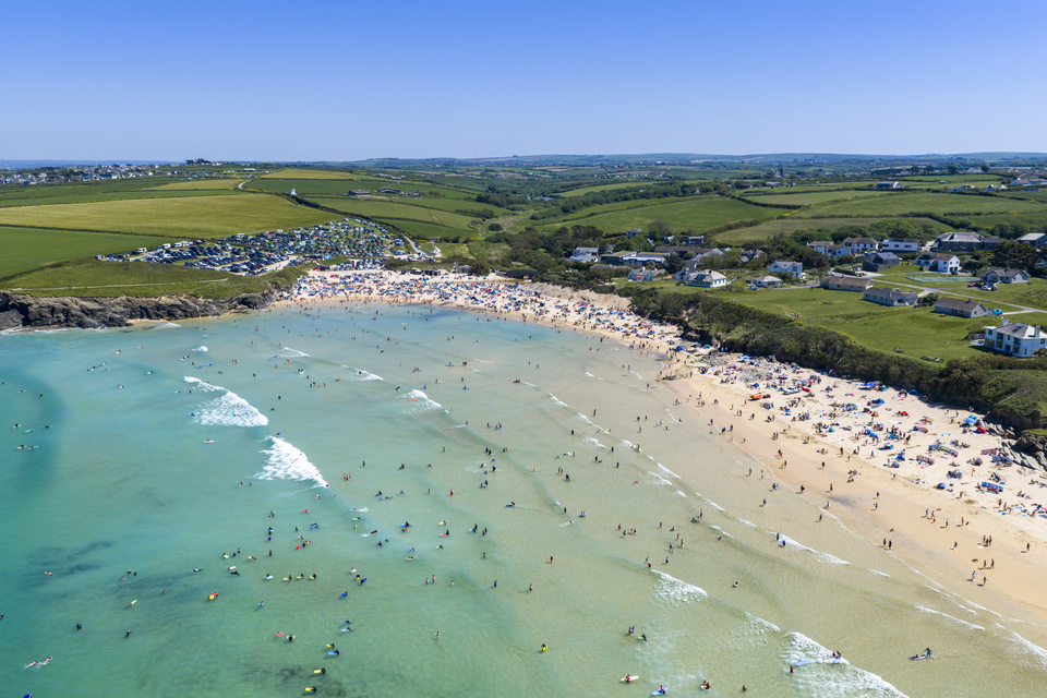Swimmers in the shallows at Harlyn Bay, Cornwall