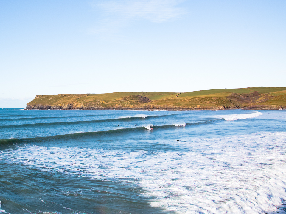 Polzeath surfers surfing