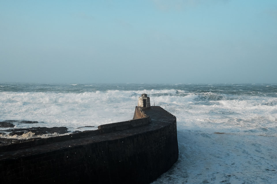 the monkey hut at portreath on a stormy day